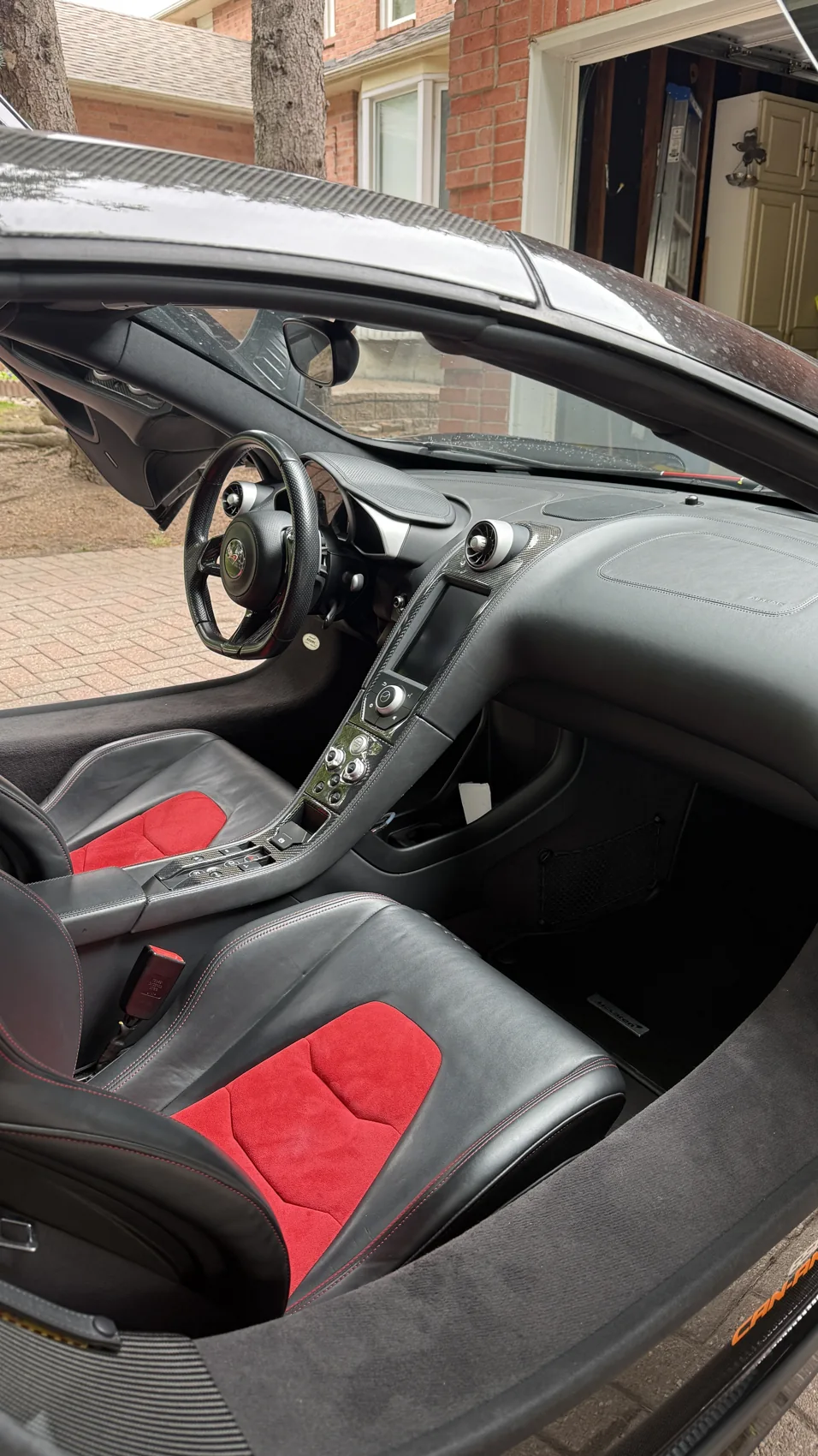 McLaren cockpit and passenger seat after interior detailing