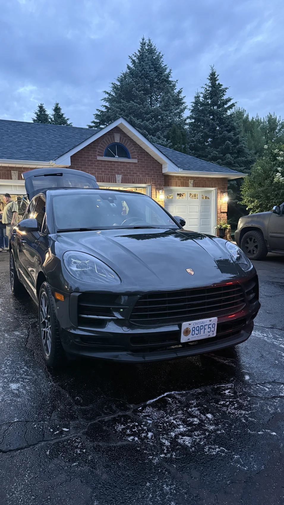 Black Lamborghini Urus photographed from the front after an exterior detail