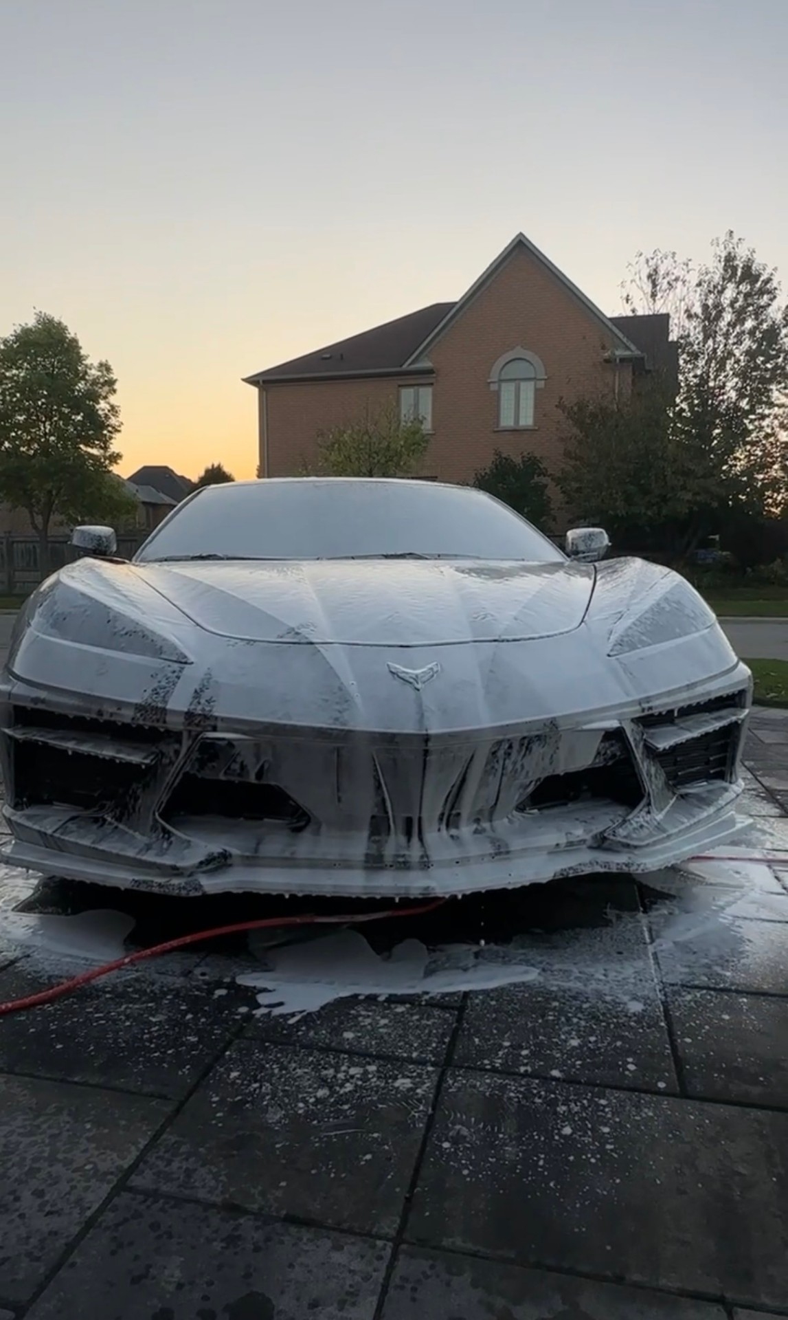C8 Corvette covered in foam during wash